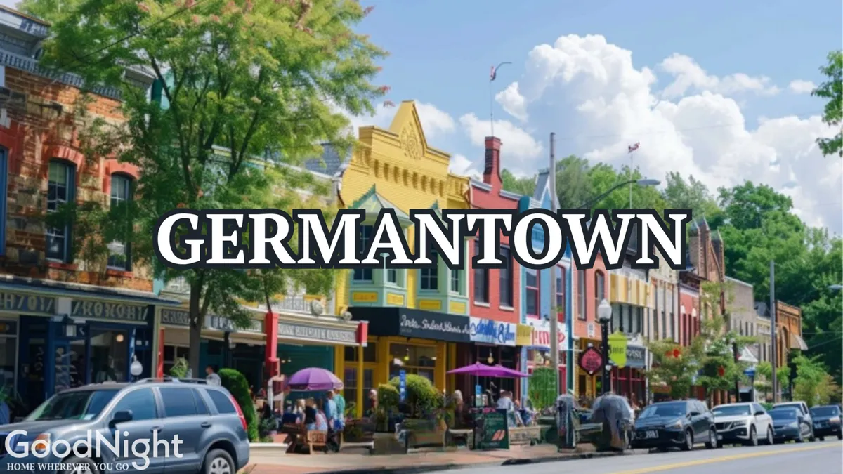 A lively city street scene bursting with color from storefronts and greenery. People stroll along the sidewalk, shopping, dining outdoors, and socializing, creating a vibrant community atmosphere. The lush trees and active street life capture the essence of an urban neighborhood hotspot.